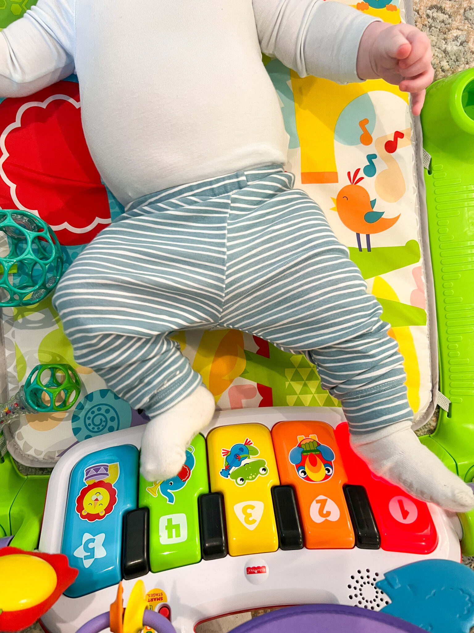 The Absolute Best Toys for 4 Month Olds That They'll Actually Play With Messy Bun Motherhood